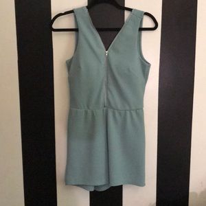Teal Colored romper with zippers front & black